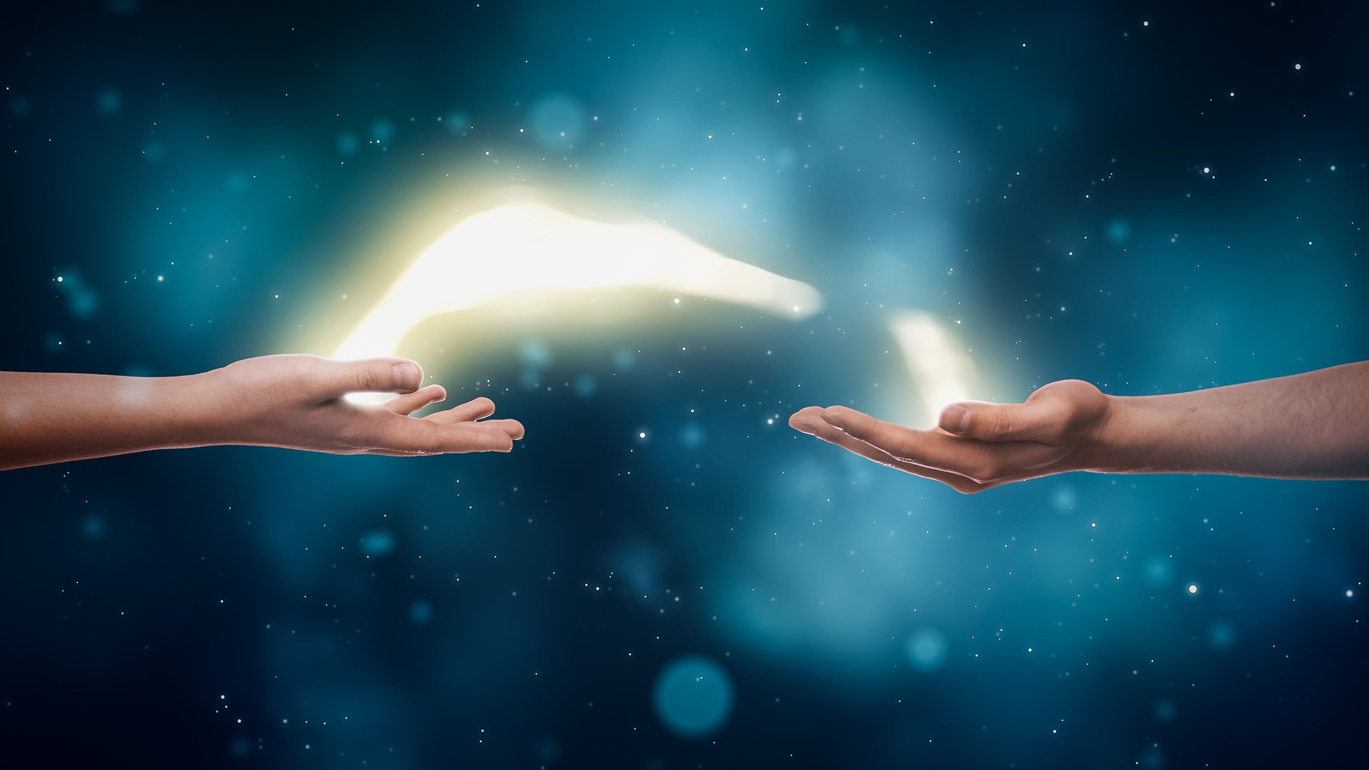 Visualization Of Two Hands Exchanging Bright Yellow Stream Of Magical Energy On Dreamy Dark Blue Background. Two People With Spiritual Connection Charging Each Other With Positive Power Concept